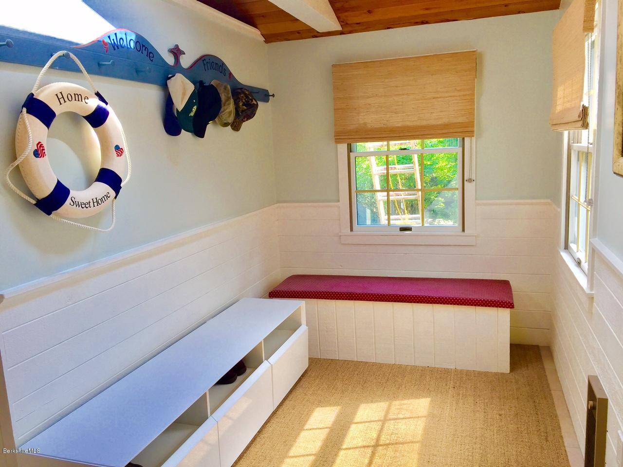 77 North Gate Island Road Otis, MA 01029 - Photo 14 of 25 a bathroom with a tub and a window