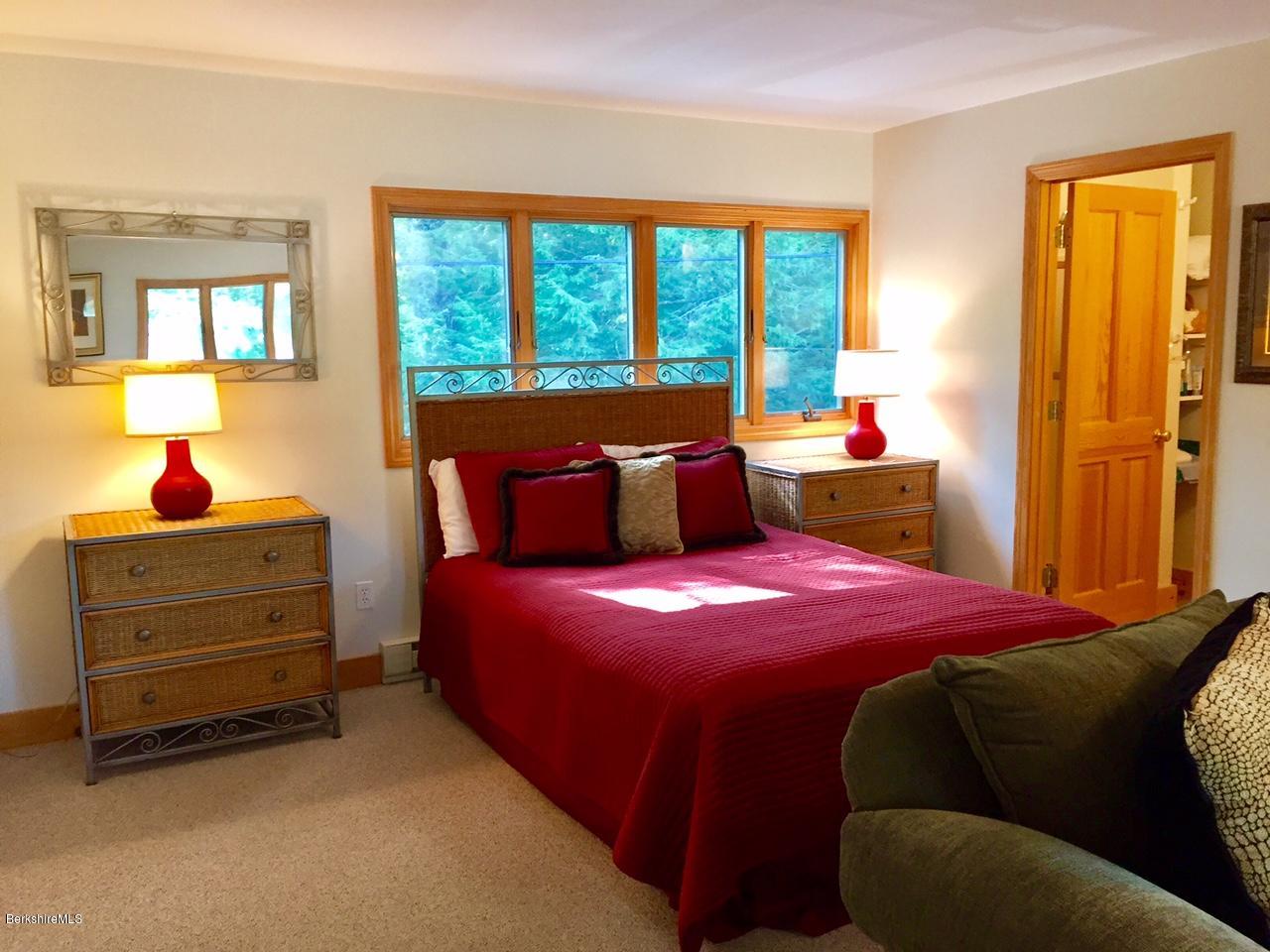 77 North Gate Island Road Otis, MA 01029 - Photo 23 of 25 a bedroom with a bed and a window