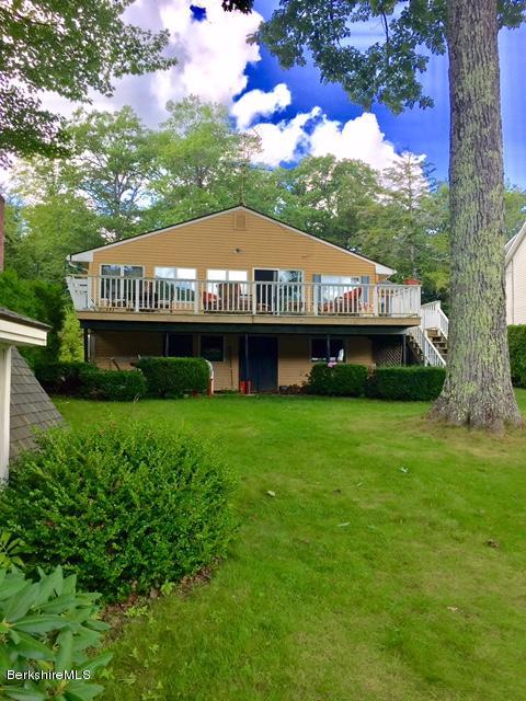 77 North Gate Island Road Otis, MA 01029 - Photo 5 of 25 a view of a house with a yard