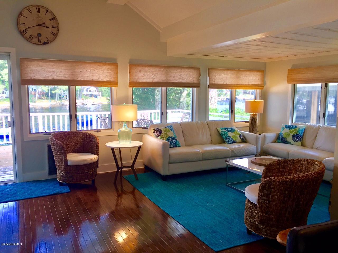 77 North Gate Island Road Otis, MA 01029 - Photo 7 of 25 a living room with furniture and a large window