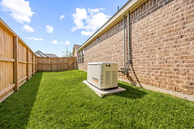 a view of backyard with a garden and entertaining space