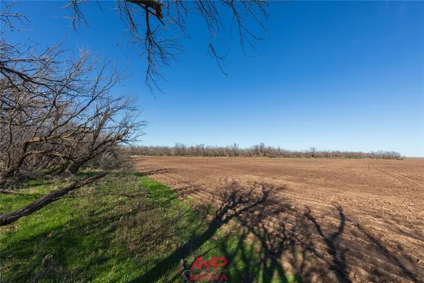 a view of lake with green space