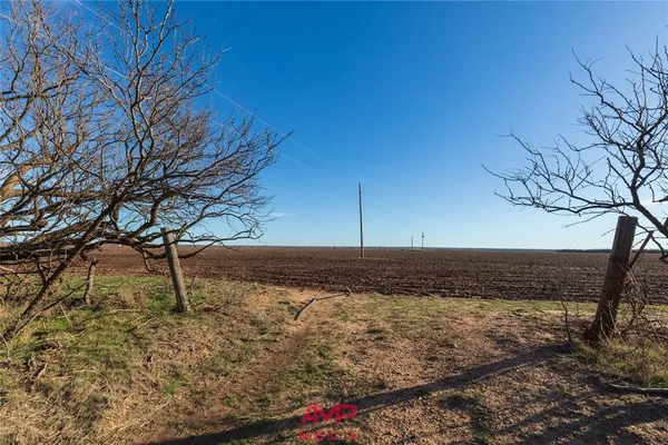 a view of lake with green space