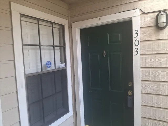 a bathroom with a mirror