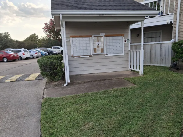 a view of a swimming pool with a terrace