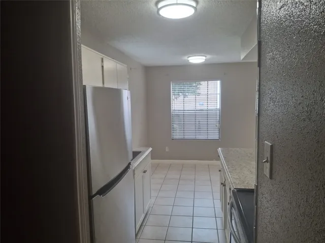 a view of entryway with stairs and wooden floor