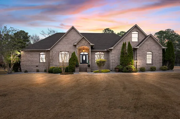 front view of a house and a yard