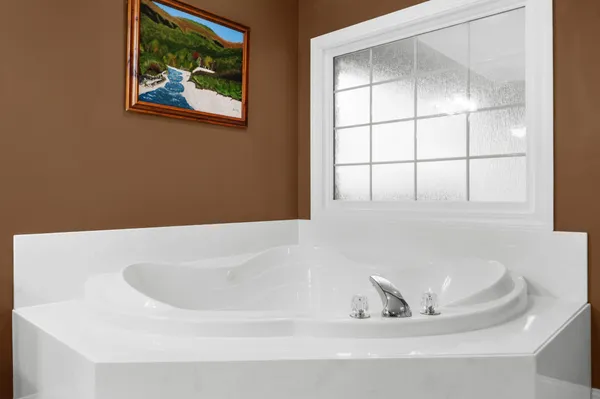 a bathroom with a shower and a toilet