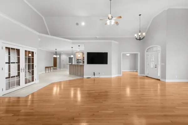 a kitchen with stainless steel appliances granite countertop a stove sink and cabinets