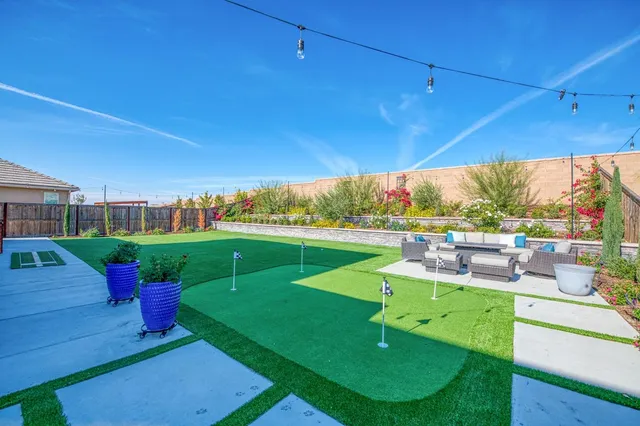 an aerial view of a house with a lake view