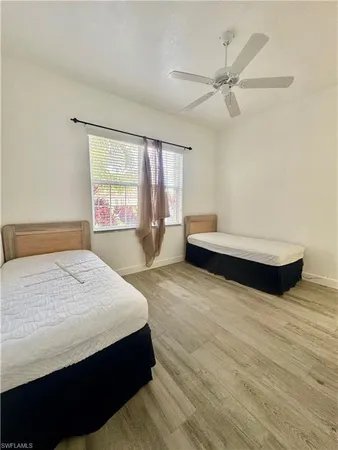 a view of a livingroom with furniture and a gate