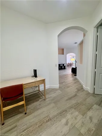 a view of room with hardwood floor