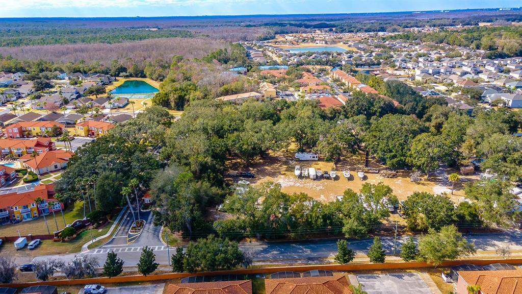 940 North Roma Way Kissimmee, FL 34746 - Photo 2 of 15 an aerial view of multiple house