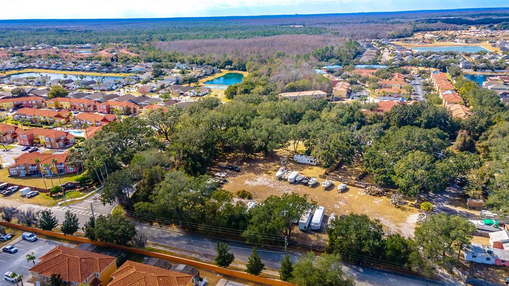 940 North Roma Way Kissimmee, FL 34746 - Photo 3 of 15 an aerial view of multiple house