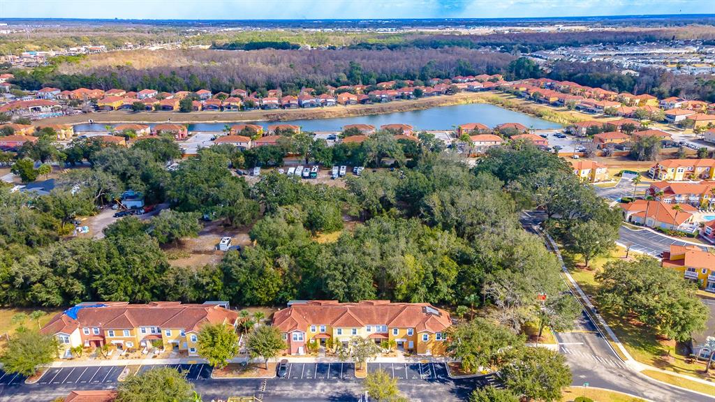940 North Roma Way Kissimmee, FL 34746 - Photo 4 of 15 an aerial view of residential houses with outdoor space