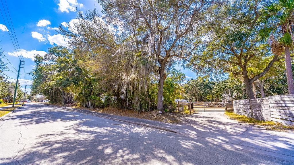 940 North Roma Way Kissimmee, FL 34746 - Photo 8 of 15 a view of a swimming pool with an outdoor space and seating area