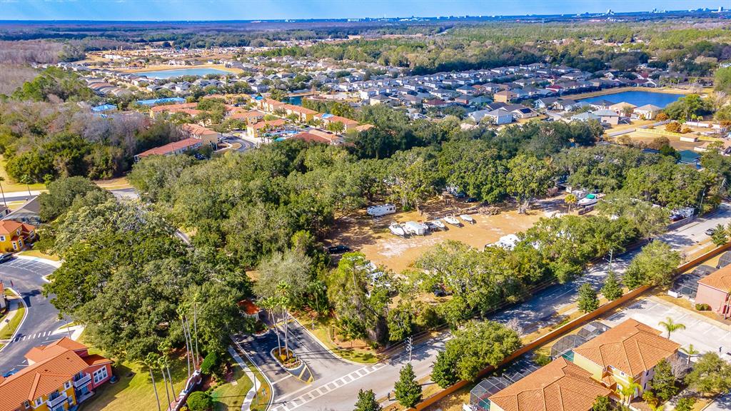 940 North Roma Way Kissimmee, FL 34746 - Photo 9 of 15 an aerial view of residential houses with outdoor space