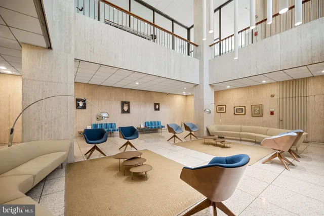 a view of a living room and dining room