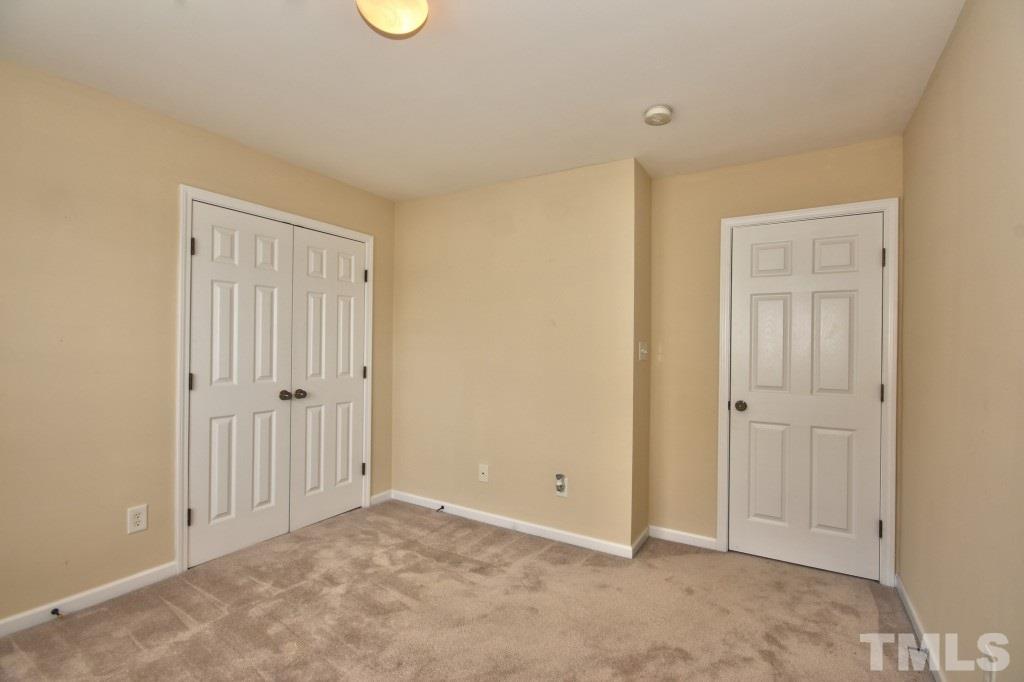9904 Grettle Court Raleigh, NC 27617 - Photo 16 of 22 Great closets in both bedrooms for all the space you need!