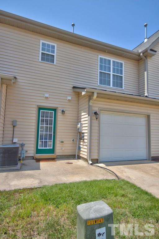 9904 Grettle Court Raleigh, NC 27617 - Photo 18 of 22 Garage in the back for parking and patio area for grilling!