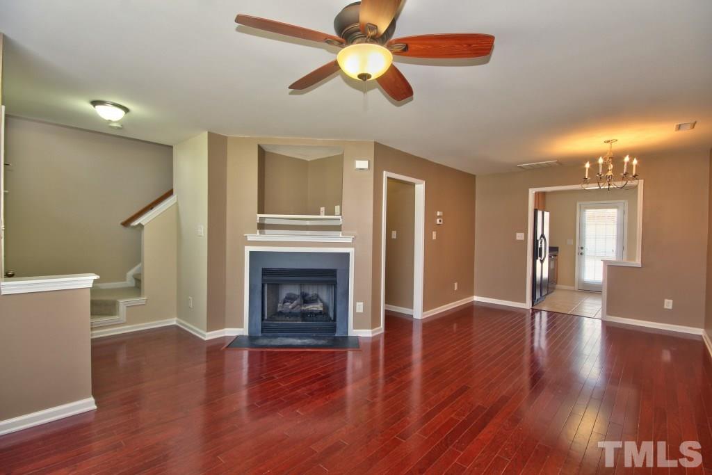 9904 Grettle Court Raleigh, NC 27617 - Photo 5 of 22 This room allows for plenty of natural light and there is a half bath for guest's convenience down stairs.