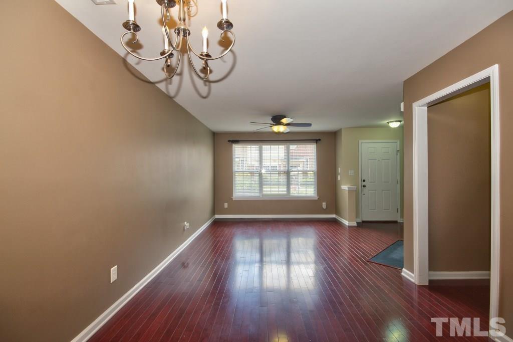 9904 Grettle Court Raleigh, NC 27617 - Photo 6 of 22 Serve your family and friends dinner in this lovely dining room with hard woods!