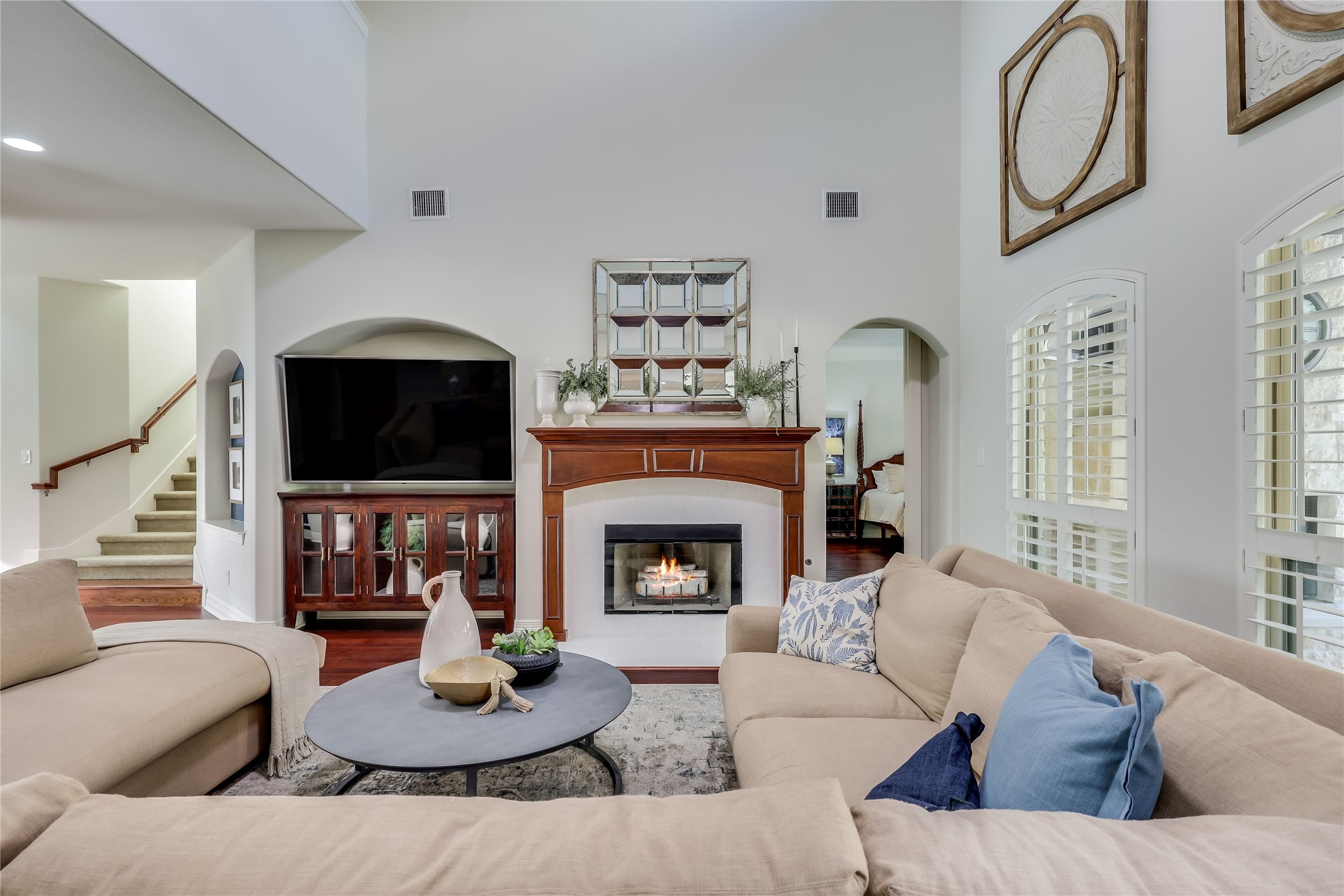 401 Bluff View Road Cedar Park, TX 78613 - Photo 27 of 40 A striking fireplace with a rich wooden mantel anchors this inviting living space.
