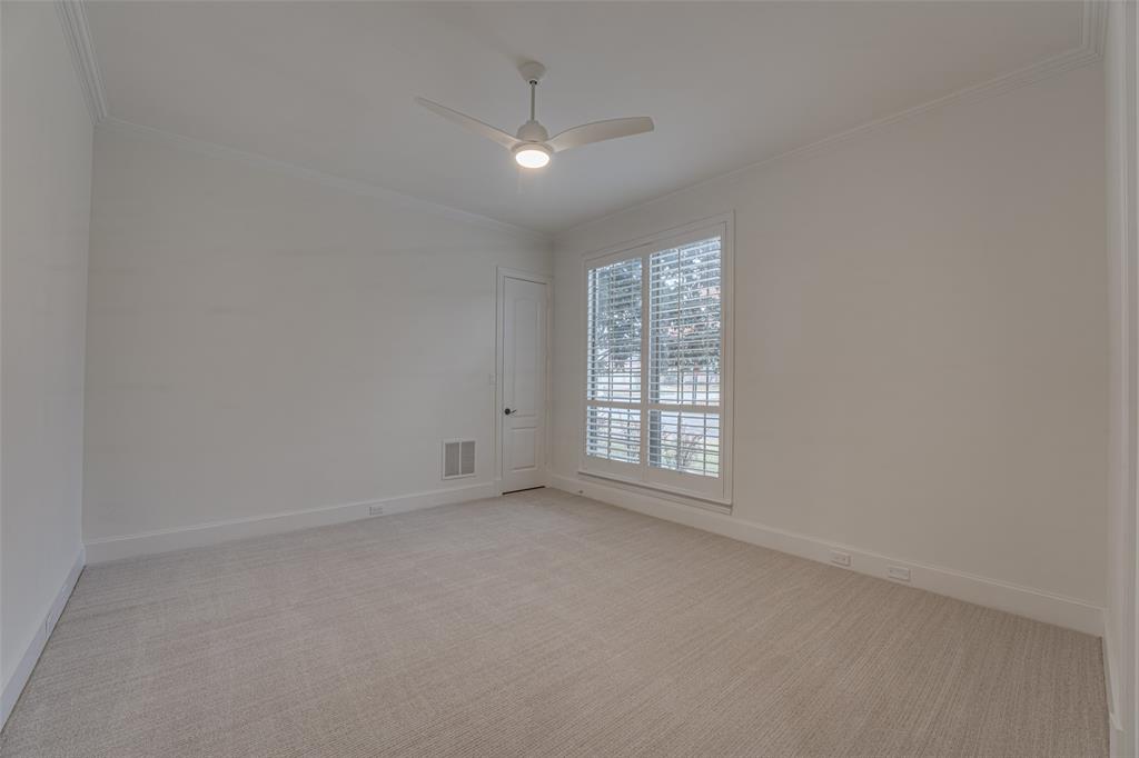2216 Kings Pass Heath, TX 75032 - Photo 25 of 40 First floor guest room