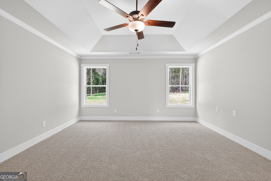 206 Airport Road, Unit 11 Canon, GA 30520 - Photo 22 of 34 a view of an empty room with a window