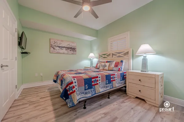 a view of a livingroom with wooden floor
