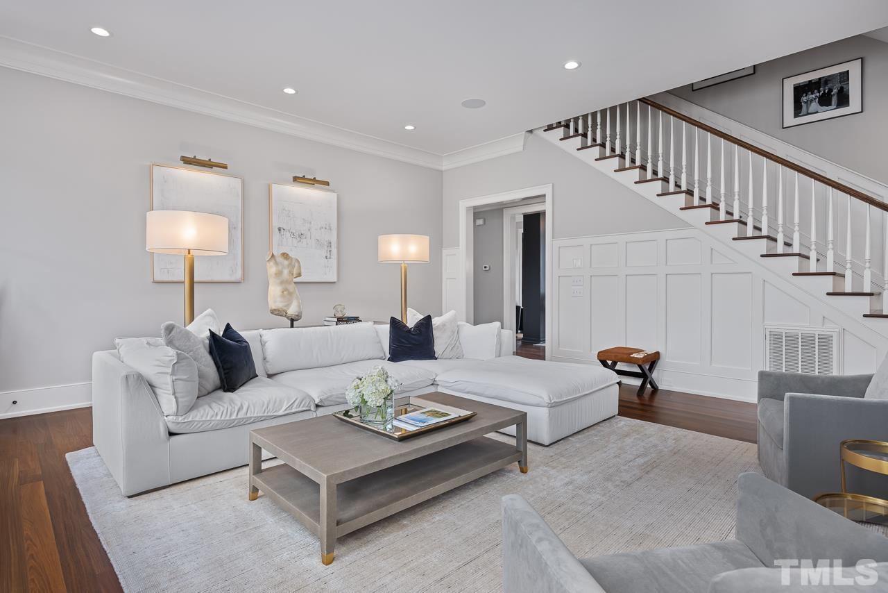2908 Allansford Lane Raleigh, NC 27613 - Photo 15 of 64 a living room with furniture and a lamp
