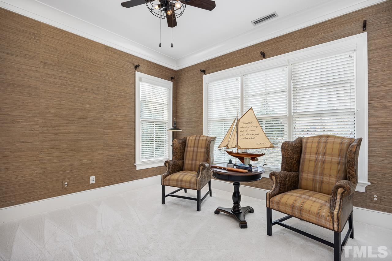 2908 Allansford Lane Raleigh, NC 27613 - Photo 42 of 64 a living room with furniture and a window