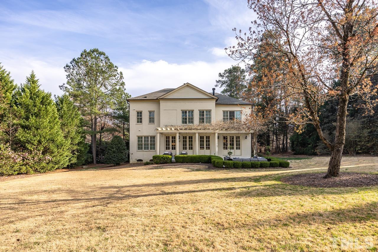 2908 Allansford Lane Raleigh, NC 27613 - Photo 52 of 64 a front view of a house with a yard