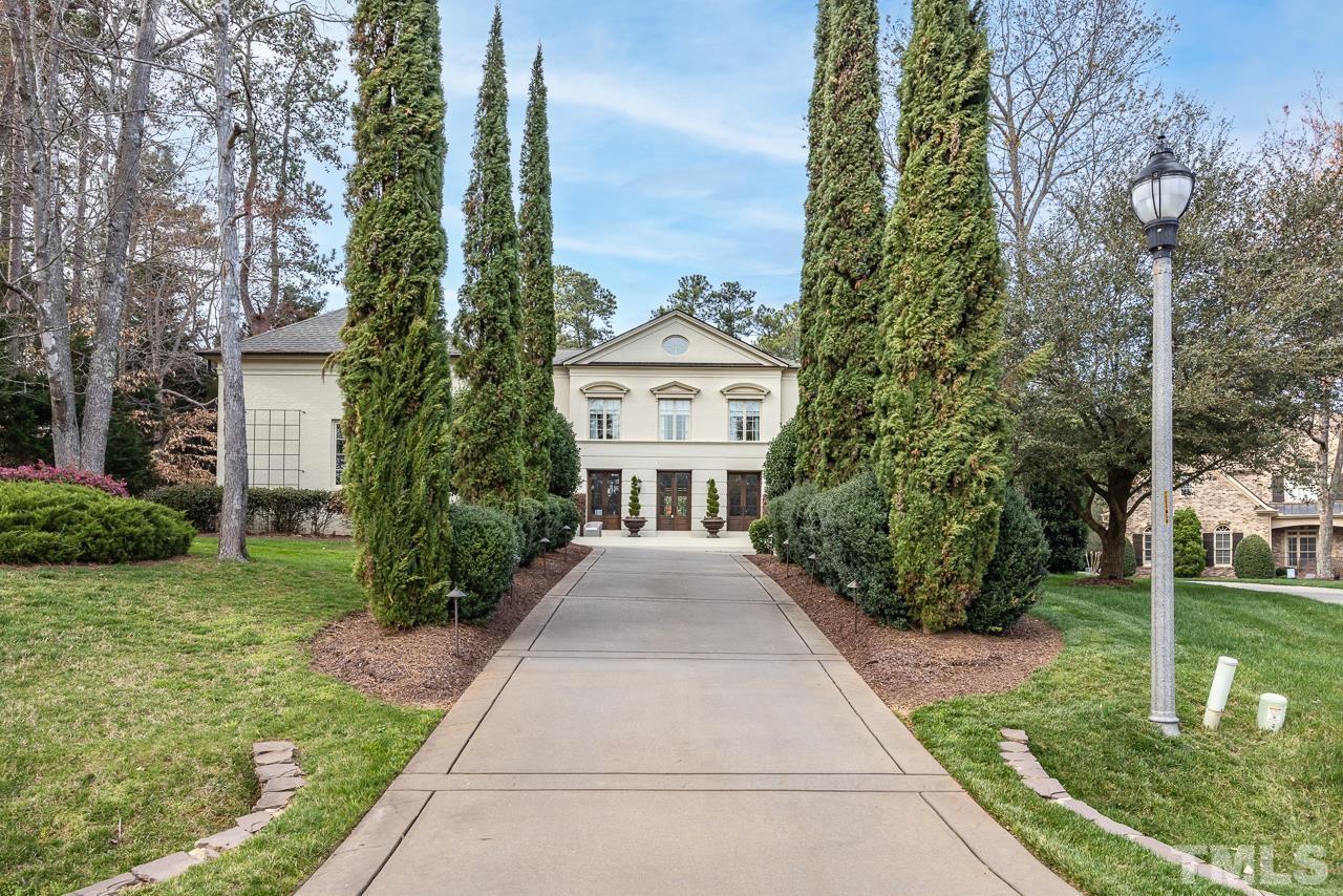 2908 Allansford Lane Raleigh, NC 27613 - Photo 57 of 64 a view of a garden with large trees