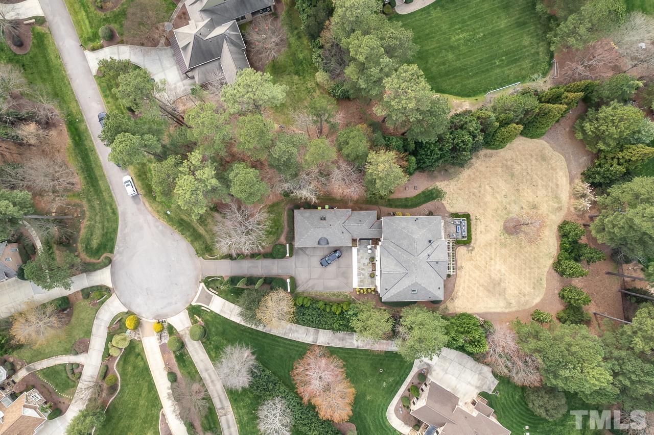 2908 Allansford Lane Raleigh, NC 27613 - Photo 64 of 64 an aerial view of a house with outdoor space