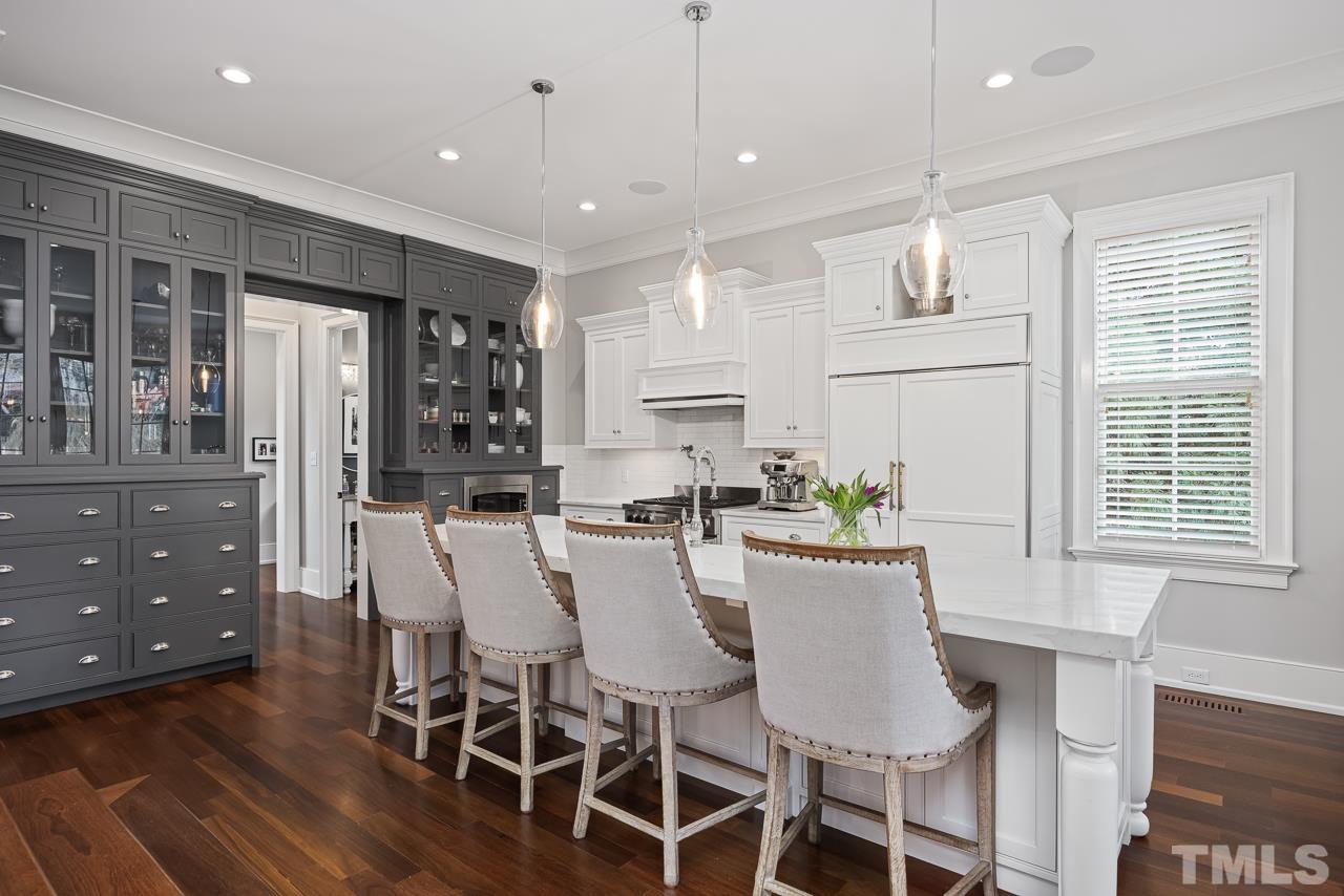 2908 Allansford Lane Raleigh, NC 27613 - Photo 10 of 64 a view of a dining room with furniture window and wooden floor
