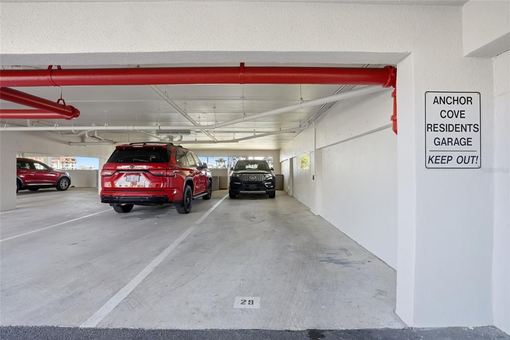 363 Pinellas Bayway South, Unit 29 Tierra Verde, FL 33715 - Photo 38 of 59 a view of a car in garage