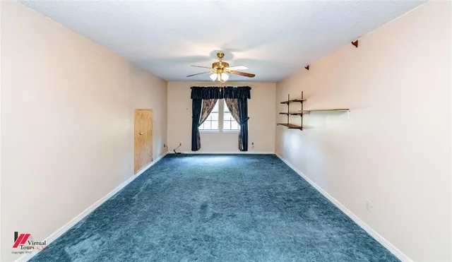 a view of a hallway with a chandelier