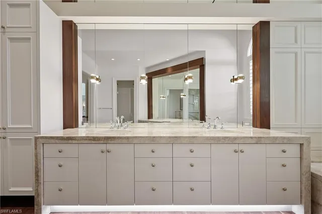 wooden view of a hallway with wooden floor and staircase
