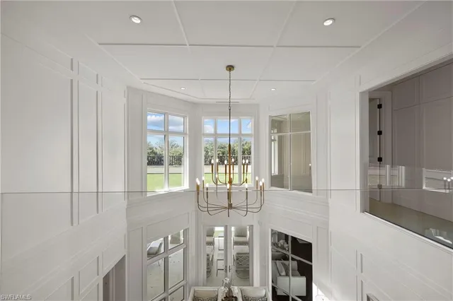 a view of a livingroom with furniture wooden floor and window
