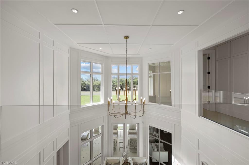 8057 Via Vecchia Naples, FL 34108 - Photo 21 of 42 a view of an entryway with dining area