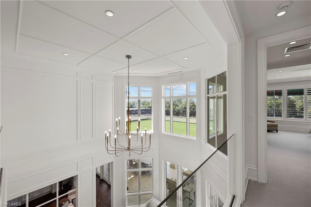 8057 Via Vecchia Naples, FL 34108 - Photo 22 of 42 a view of a livingroom with furniture wooden floor and window