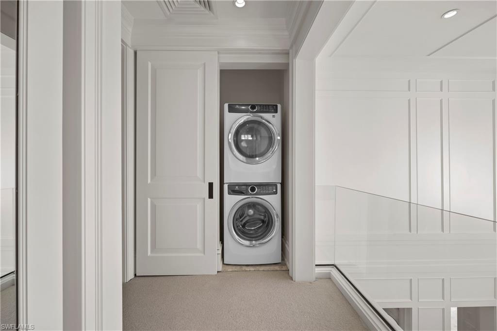 8057 Via Vecchia Naples, FL 34108 - Photo 34 of 42 a utility room with dryer and washer