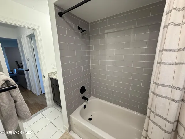 a bathroom with a bathtub