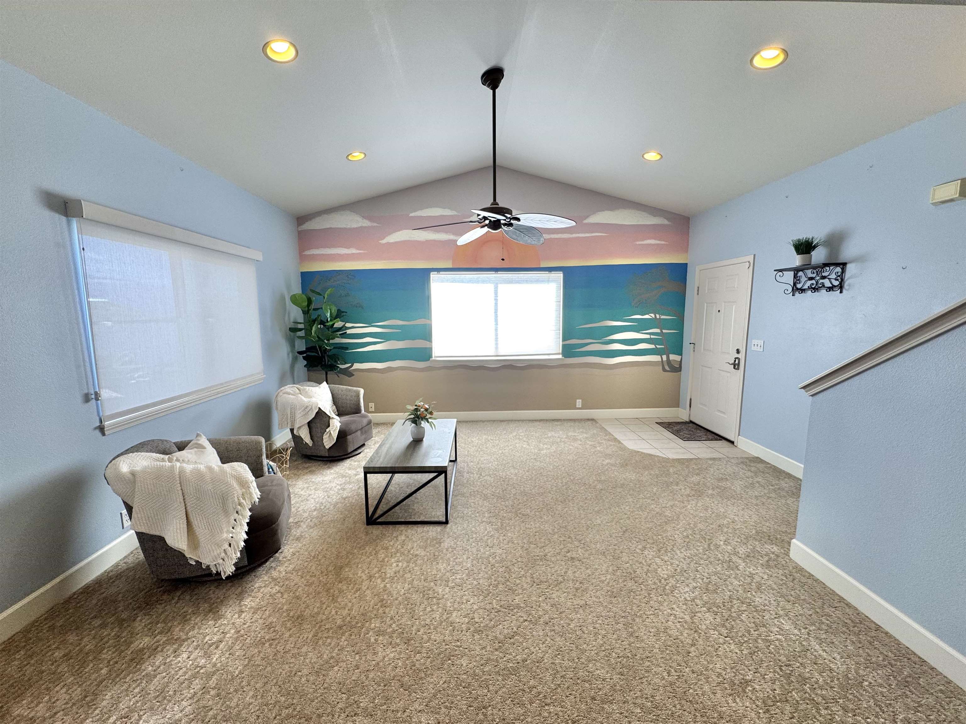 159 Iniiniki Street Wailuku, HI 96793 - Photo 14 of 33 a living room with furniture and a chandelier