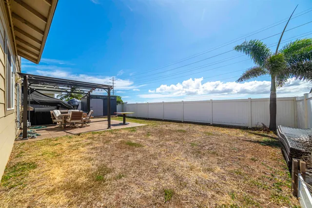 a view of back yard of the house