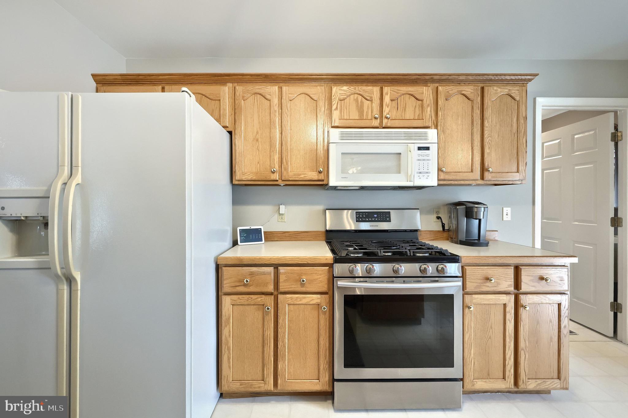70 Test Road Hanover, PA 17331 - Photo 13 of 39 a kitchen with a stove a sink and a refrigerator