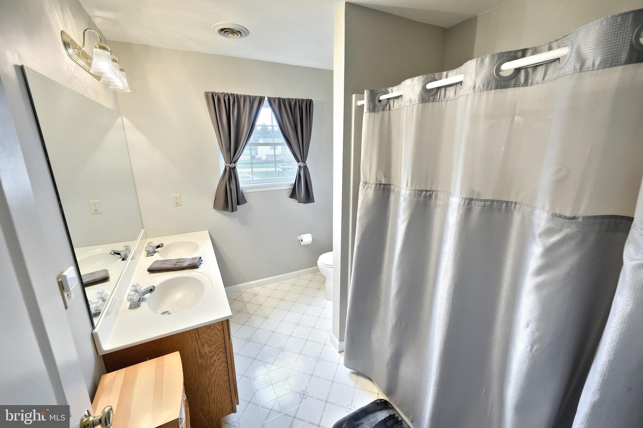 70 Test Road Hanover, PA 17331 - Photo 22 of 39 a bathroom with a sink and a mirror