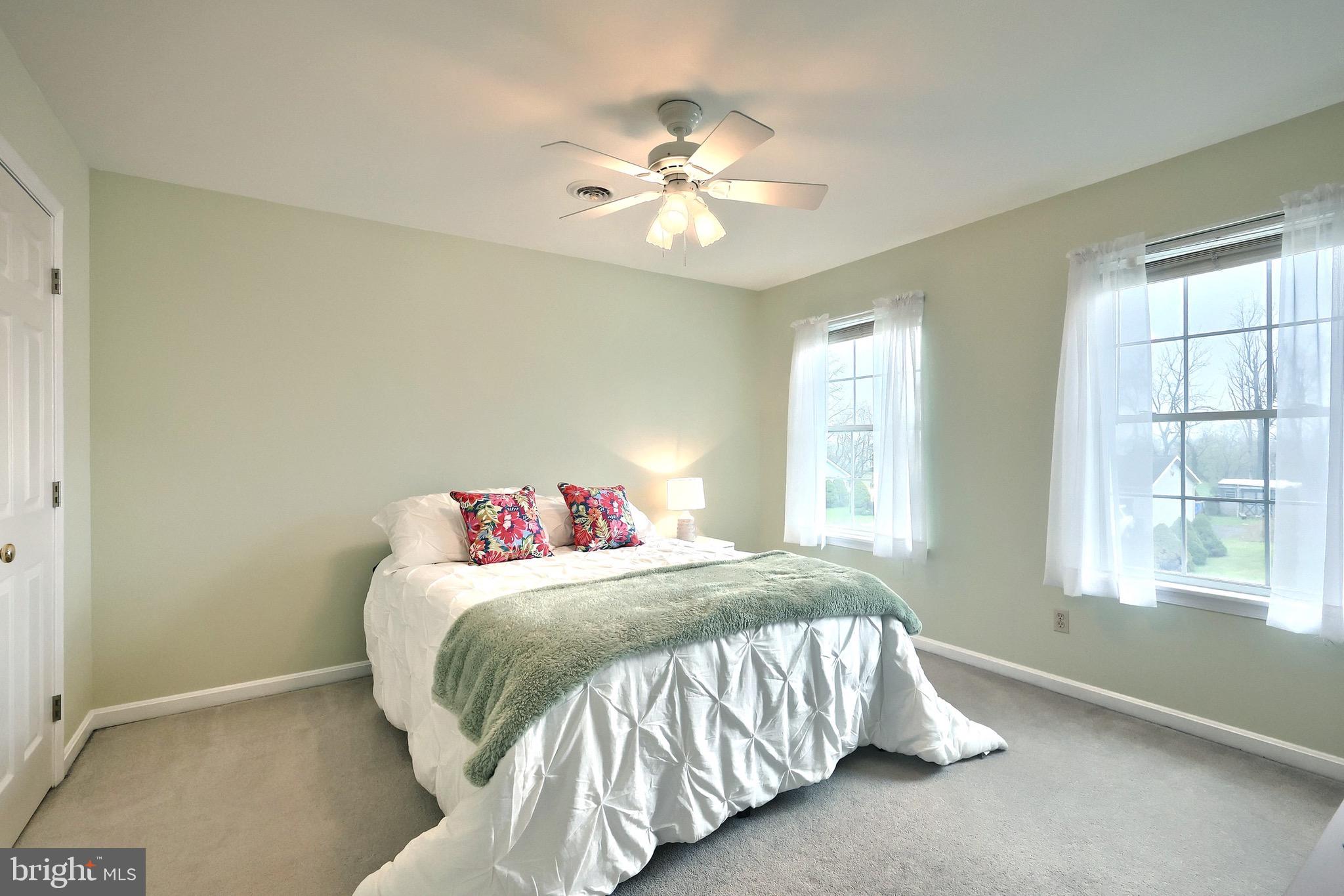 70 Test Road Hanover, PA 17331 - Photo 23 of 39 a bedroom with a bed and a chandelier
