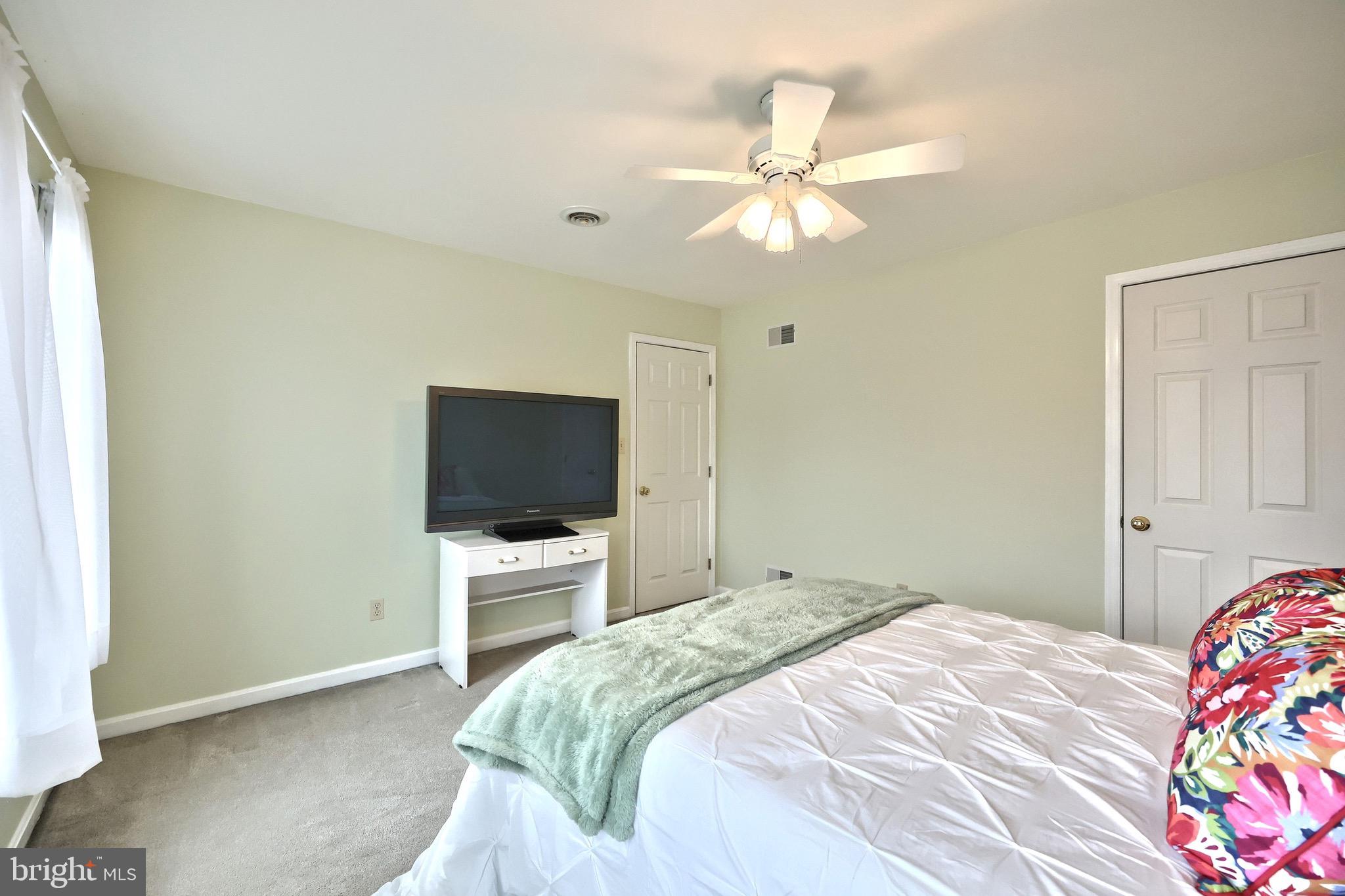 70 Test Road Hanover, PA 17331 - Photo 24 of 39 a bedroom with a bed and a flat screen tv